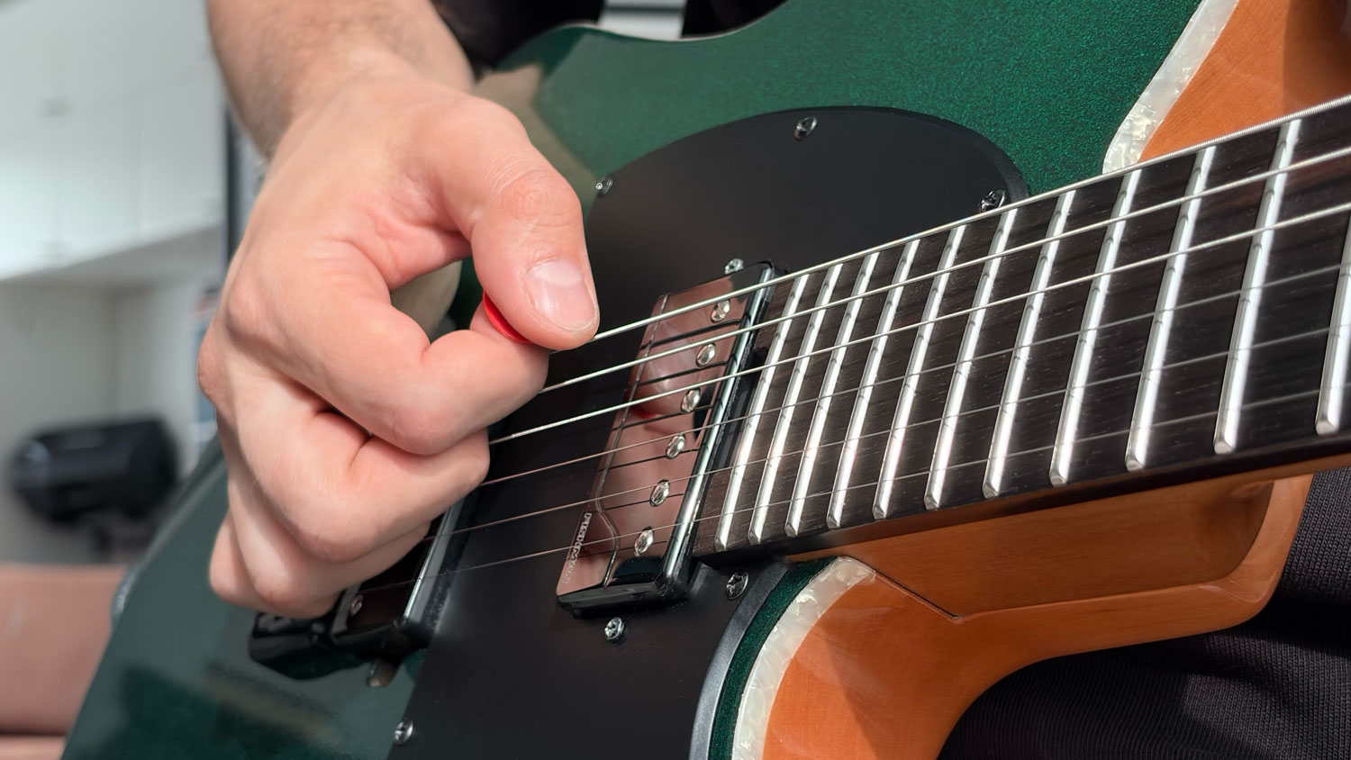 Picking Hand Position: How to Play Faster With Less Tension
